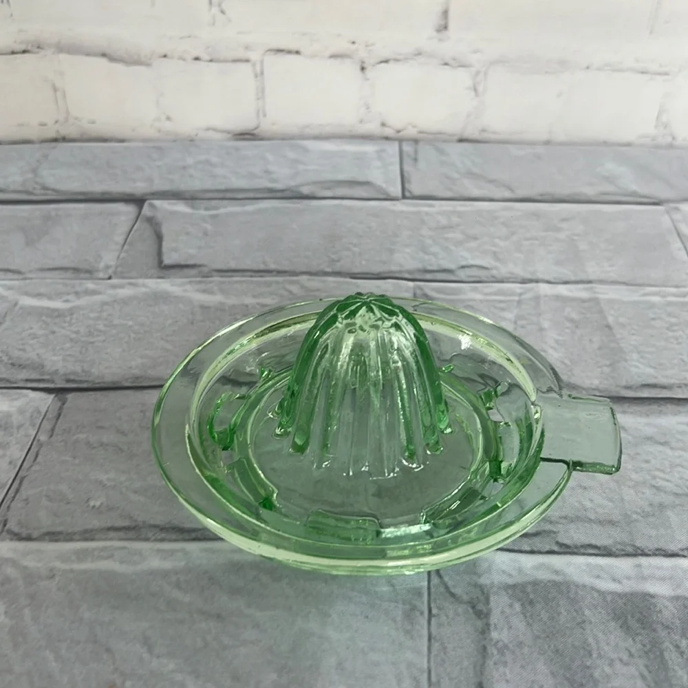 Vintage green Vaseline glass juicer